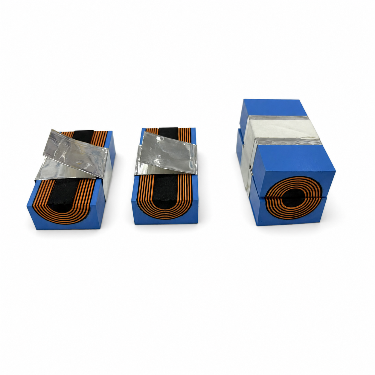 Worker trimming and grinding module edges under inspection light